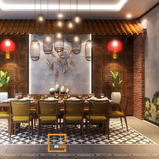 Dining space decorated in vintage Vietnamese countryside style with wooden furniture, lanterns, and floral murals